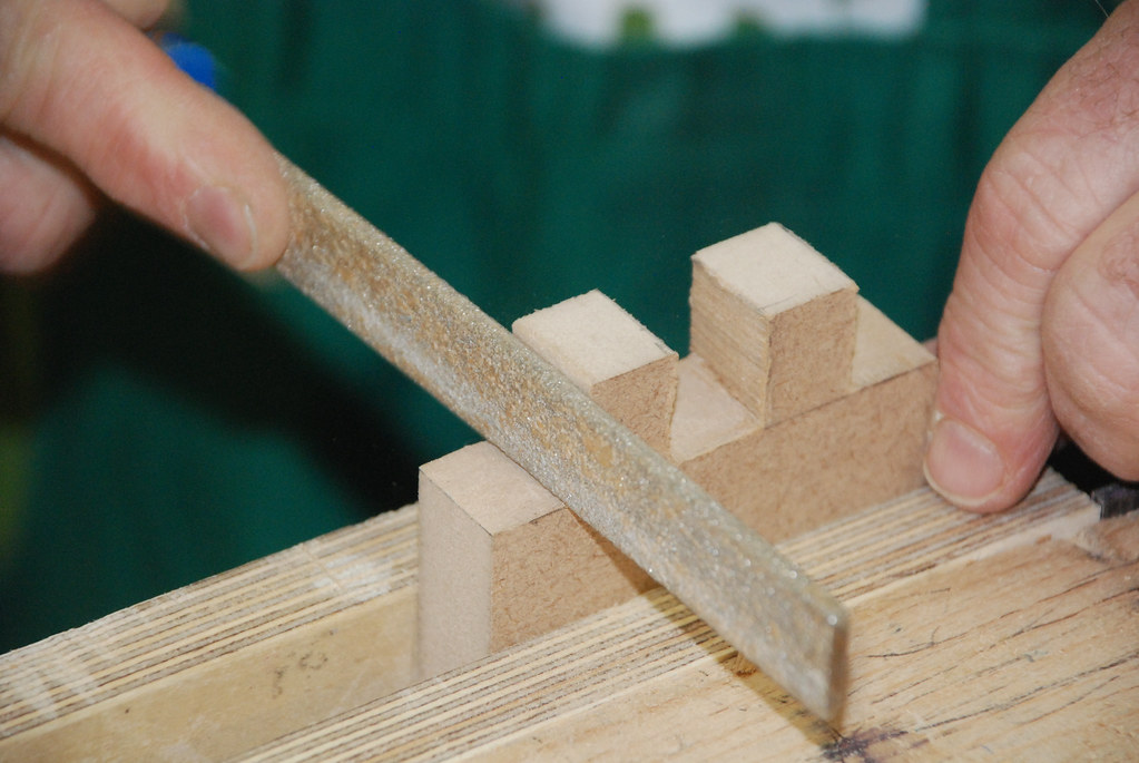 Carpenter demonstrating various joint techniques