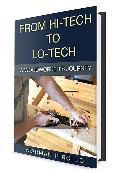 Carpenter reading woodworking instruction book