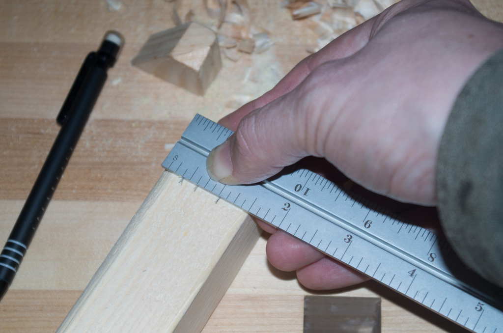 carpenter measuring joints combination square